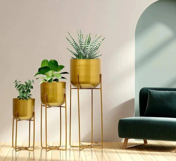 Rural gold metal planter with stand